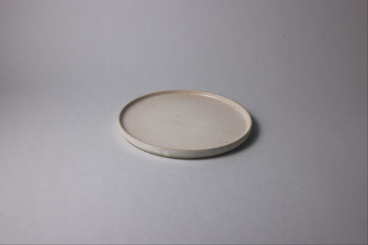 Medium stoneware plate with matte finish, beige