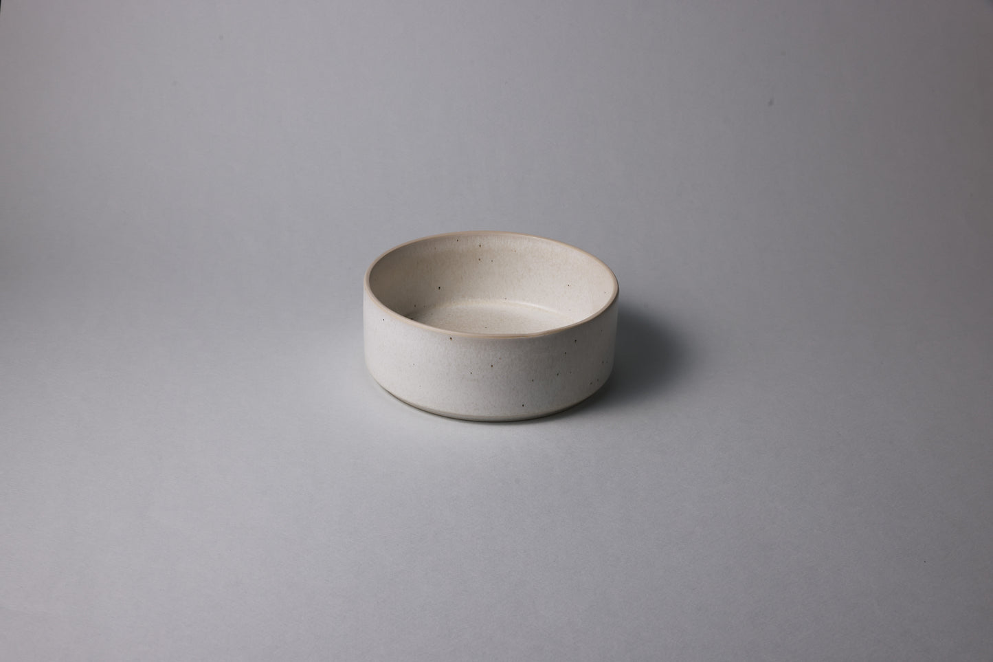 Large stoneware bowl with matte finish, warm white