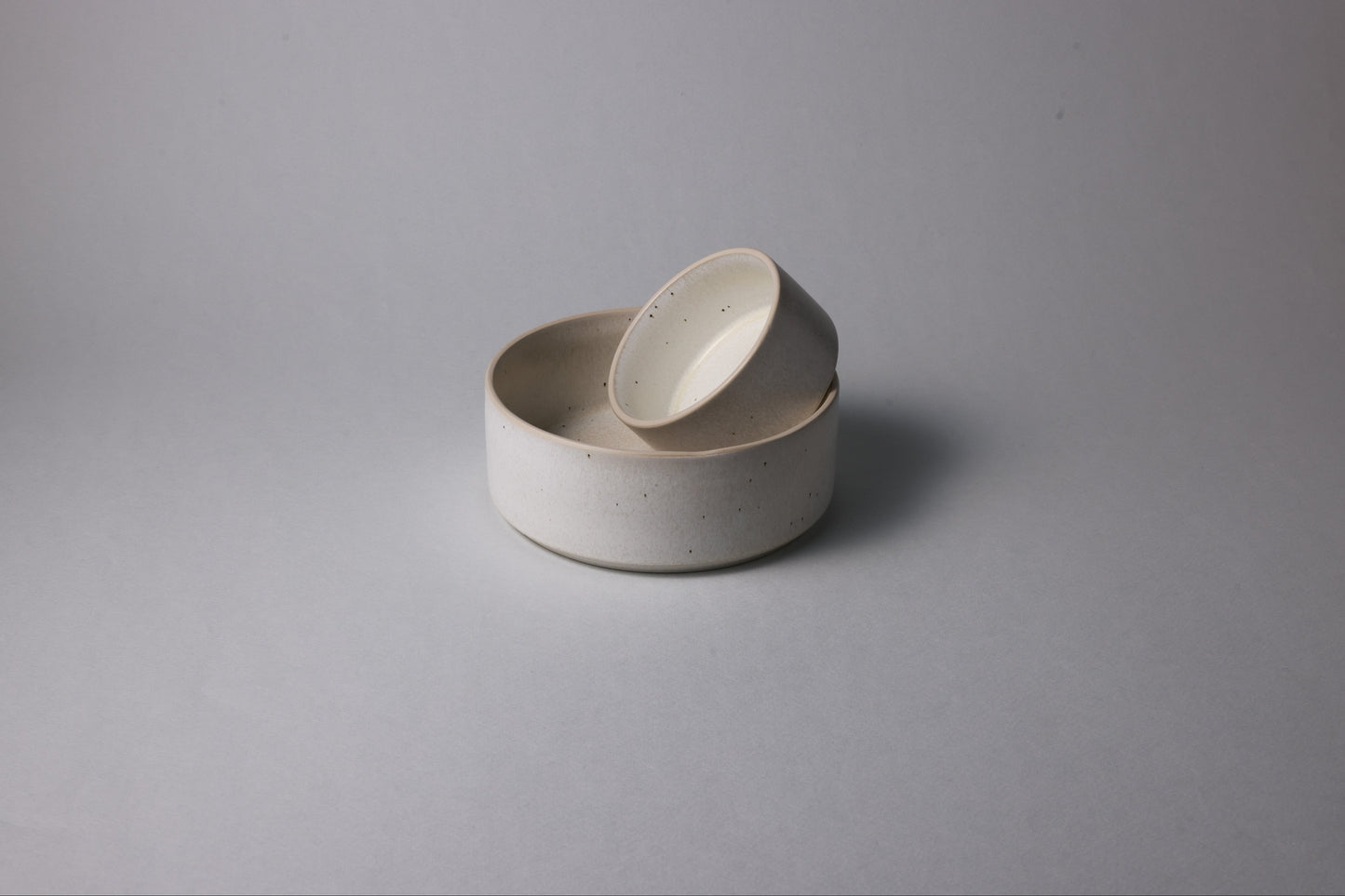 Two stoneware bowls with matte finish, beige