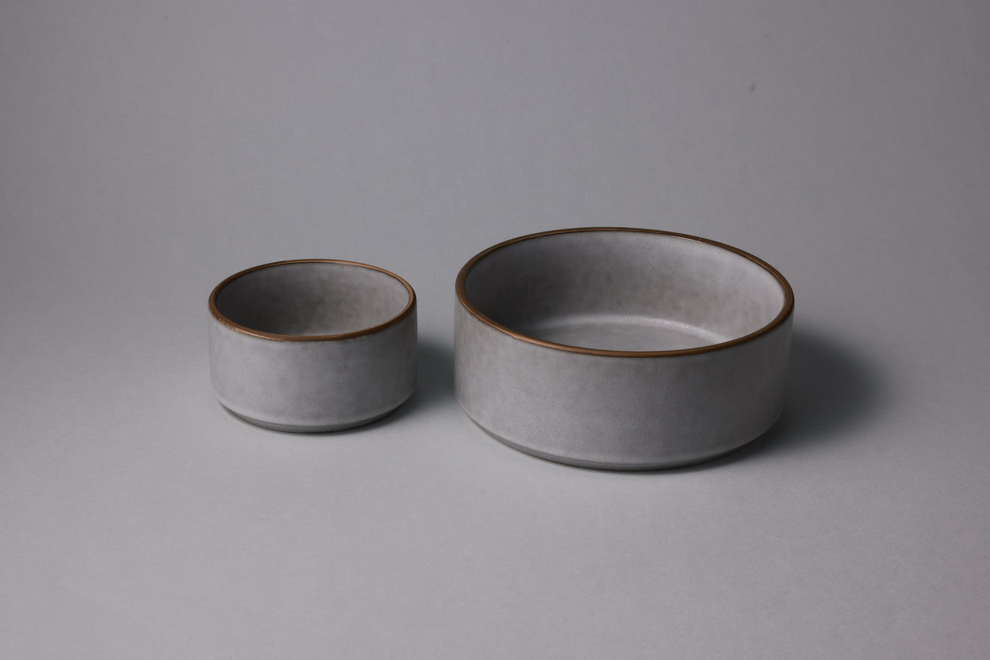 Two stoneware bowls with matte finish, calm gray
