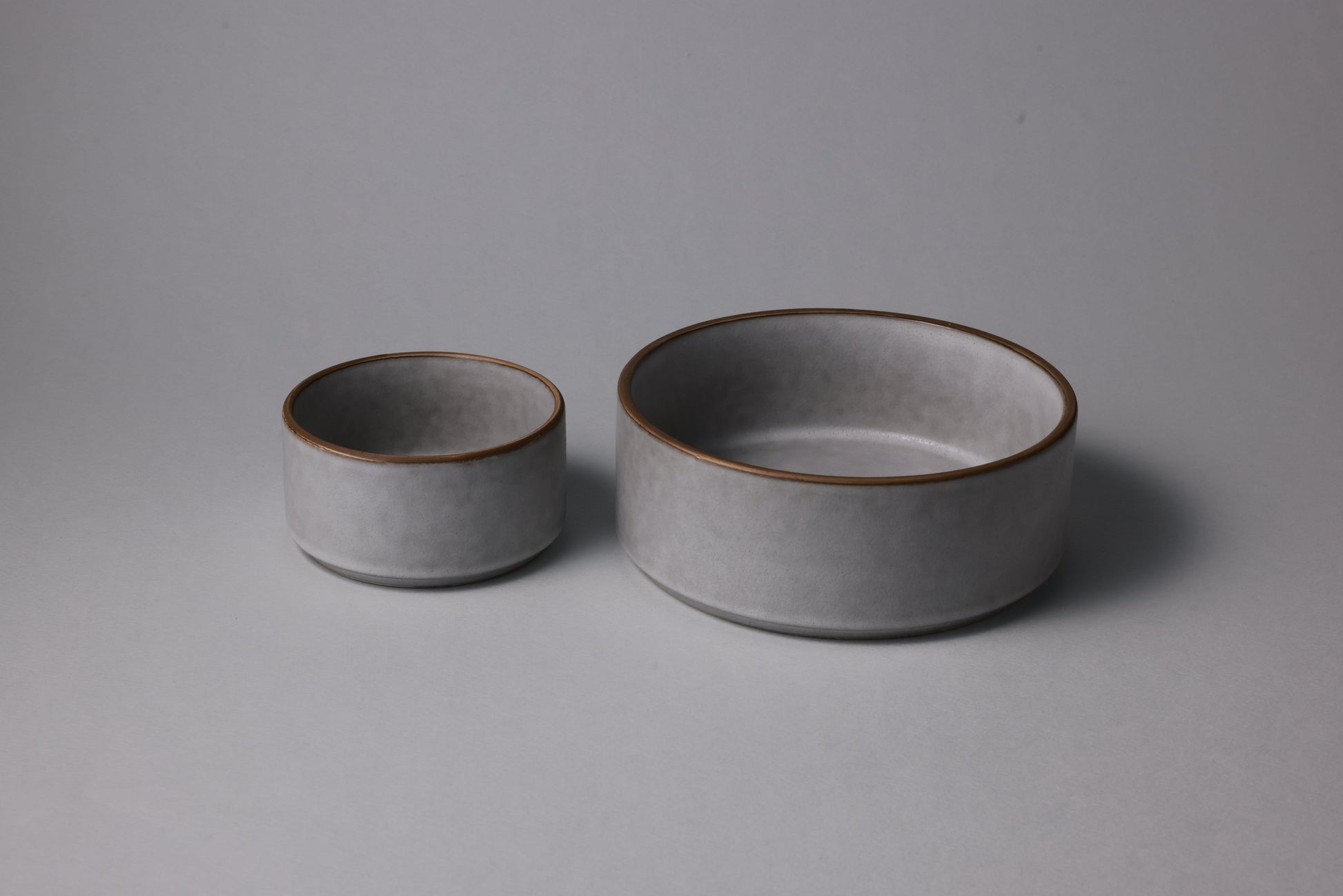 Two stoneware bowls with matte finish, calm gray